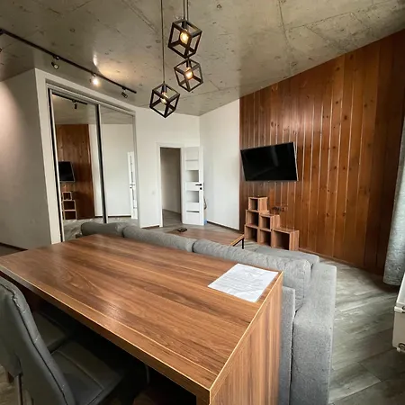 стильный лофт в аркадии - спальня и кухня-студия боковой вид моря! Apartment
