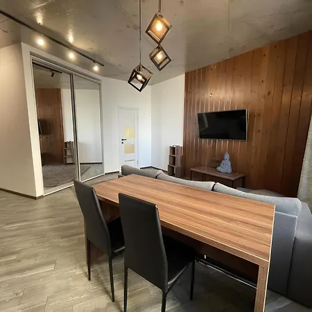 стильный лофт в аркадии - спальня и кухня-студия боковой вид моря! Apartment *